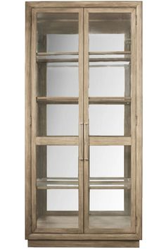 a wooden cabinet with glass doors on the front and bottom shelves in whitewash wood