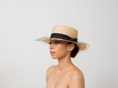 "Glamour" Cordovan Hat 100% Toquilla straw. This natural fiber is known for its quality and beauty. The perfect beach-to-city accessory. Each hat takes approximately two to three days to weave by hand by our Ecuadorian artisans, and after pressed for shape. Indulge in pure luxury with our "Glamour" Cordovan Hat. Handmade with toquilla straw and adorned with delicate tulle, this hat will elevate any outfit. Embody sophistication and exclusivity with every wear. -We ship with DHL Express. Shipping takes approximately 3 to 5 days to arrive depending on the destination.-Need Help? Please contact: customercare@sensistudio.com-All Sales Are Final. Summer Flat Brim Sinamay Hat, Summer Sinamay Hat With Flat Brim, Summer Wide Brim Sinamay Hat, Flat Brim Sinamay Straw Hat, Summer Brimmed Boater Hat In Sinamay, Summer Flat Brim Straw Hat For Races, Summer Races Flat Brim Straw Hat, Elegant Natural Panama Hat, Summer Races Straw Hat With Flat Brim