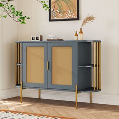 a sideboard with two doors and wicker panels on the front in a living room