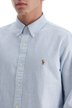 This casual Polo Ralph Lauren shirt is made of striped Oxford cotton and features the iconic Pony logo embroidered on the chest. The design includes a button-down collar, classic cuffs, and an American-style placket with a back yoke and box pleat. The model is 182 cm tall and wears size L. Composition: 100%CO Ralph Lauren Logo, Equestrian Style, Ralph Lauren Shirt, T-shirt Polos, Trouser Jeans, Ralph Lauren Men, Logo Embroidered, Custom Fit, Sweatshirt Shirt