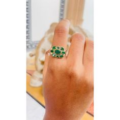 This is part of Chairish’s Fine Jewelry assortment.  Emerald ring in 14K Gold which perfectly goes with your personality and also helps you to improve your creativity. Designed with emeralds and diamonds that makes it a perfect fit to wear it on your wedding, occasions or style it with any of your basic outfit to give it a glam. This gorgeous ring is a great bridesmaid, wedding or christmas gift for anyone on your list.  PRODUCT DETAILS :-  Material - 14K Solid Yellow Gold Gemstone - Emerald Gem Green Multi-stone Diamond Ring, Green Diamond Open Ring, Green Multi-stone Sapphire Diamond Ring, Multi-stone Round Cut Emerald Ring, Emerald Multi-stone Round Cut Ring, Emerald Ring With Diamond Accent Stones, Diamond Emerald Ring With Accent Stones, Emerald Diamond Ring With Accent Stones, Round Cut Multi-stone Emerald Ring