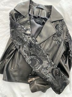 Norr Hammour  Sophia Zip-Front Lambskin Leather Jacket w/ Studded Embroidered Sleeves Size 40 Sold out everywhere!  100% authentic!  Purchased in Neiman Marcus  Retail: $1150 Amazing cropped leather jacket In immediate condition The leather on this is like butter -so soft! Sleeve: 23" Chest when zipper 18: Shoulder to hem: 19" Amazing accentuated zippers Sold as you see in photos This will ship wish signature and insurance  Gentle signs of wear means any and all flaws are mentioned in the listin Luxury Embellished Winter Outerwear, Winter Embellished Leather Jacket With Long Sleeves, Fitted Long Sleeve Embellished Leather Jacket, Fitted Embellished Leather Jacket With Long Sleeves, Embellished Fitted Leather Jacket With Long Sleeves, Winter Embellished Long Sleeve Biker Jacket, Designer Leather Jacket For Party, Embellished Long Sleeve Biker Jacket For Winter, Embellished Long Sleeve Biker Jacket For Fall