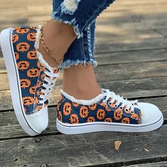 Women's Ghost Face Pumpkin Print Sneakers: Spooktacular Halloween Flat Fall Cotton Lace-up Sneakers, Lace-up Canvas Shoes For Fall Streetwear, Fall Lace-up Canvas Shoes For Streetwear, Lace-up Canvas Shoes For Streetwear In Fall, Cotton Low-top Sneakers For Fall, Fall Season Low-top Canvas Shoes, Fall Canvas Shoes For Streetwear With Round Toe, Fall Streetwear Canvas Shoes With Round Toe, Halloween Lace-up Sneakers With Rubber Sole