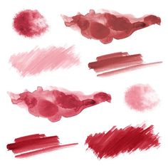 some red and pink paint strokes on a white background