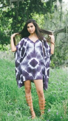 Eggplant purple Shibori tie-dyed festival dress tunic coverup poncho. Fits sizes 2 to 12. Model is 5'7"and wears size 4. Casual Purple Tunic Kaftan, Flowy Summer Poncho For Beach Cover-up, Summer Beach Poncho With Relaxed Fit, Summer Beach Poncho In Relaxed Fit, Purple Bohemian Tunic For Spring, Bohemian Purple Tunic For Spring, Purple Short Sleeve Kaftan For Beach, Relaxed Fit Poncho For Beach And Summer, Relaxed Fit Poncho For Beach In Summer