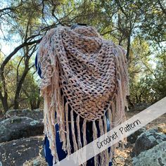 the crochet pattern for this scarf is easy to make and looks great on someone's head