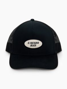 El Matador Beach Trucker Hat - 5-Panel Trucker Hat - Features "EL MATADOR BEACH" Patch Beach-style Trucker Hat With 5-panel Design, Vacation Black Baseball Cap, Summer Travel Trucker Hat, 5-panel, Black Trucker Hat For Travel, Black Dad Hat For Beach, Trucker Snapback Hat With Curved Brim For Vacation, Black 5-panel Trucker Hat For Beach, Black Snapback Trucker Hat For Beach, Black Trucker Hat For The Beach