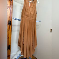 Sleevles Brown Dress Brown Rayon Maxi Length Dresses, Brown Rayon Maxi Dress, Brown Sleeveless Midi Dress For Spring, Brown Flowy Sleeveless Maxi Dress, Flowy Sleeveless Brown Maxi Dress, Brown Long Dress For Spring, Long Brown Spring Dress, Long Brown Dress For Spring, Brown Midi Length Sleeveless Dress For Spring