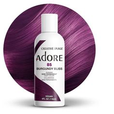 Pack of 1 Adore Hair Color - please verify color name in the Product Title Transform your hair with the vibrant and long-lasting hues of Creative Image Adore Semi-Permanent Hair Color. This innovative hair dye is designed to infuse each strand with rich, radiant color while maintaining the health and integrity of your hair. Free from harsh chemicals like ammonia, peroxide, and alcohol, Adore provides a gentle yet effective coloring experience that leaves your hair feeling soft, silky, and full of life. Adore’s unique formula is enriched with natural ingredients that nourish and condition your hair, ensuring that it remains healthy and vibrant. The semi-permanent nature of the dye means that it gradually fades over time, allowing you to experiment with different shades without the long-term Adore Hair Color, Orchid Hair Color, Raspberry Hair Color, Deep Purple Hair, Adore Hair Dye, Raspberry Hair, Burgundy Hair Dye, Semi Permanent Hair Color, Burgundy Hair