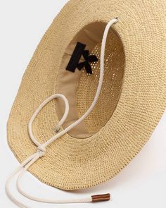 Spend your summer in the Riviera. Or at least pretend you are in this hat - an iconic, wide brimmed woven straw hat, trimmed with contrasting rope. rag & bone Women's Raffia Hat | Light Sand, Large (also in S,M)