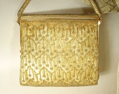 "I am so excited to be offering this SO beautiful, extremely well made, vintage Art Deco high end designer \"Walborg\" crystal rhinestone encrusted beaded gold lame flapper purse perfect for the Bride. This bag is in PRISTINE vintage condition! (It appears to be unused.) If you could see this rhinestone encrusted beaded purse in person you would know that photos are not doing it justice as they don't begin to capture the unbelievable sparkle adequately; it absolutely shimmers as it catches the l Vintage Rectangular Evening Bag For Party, Vintage Handheld Evening Bag For Party, Vintage Handmade Evening Bag For Events, Antique Handmade Wedding Bags, Antique Rectangular Wedding Bags, Vintage Rectangular Wedding Bags, Vintage Rectangular Clutch For Events, Vintage Pouch Clutch For Events, Vintage Handheld Evening Bag For Events