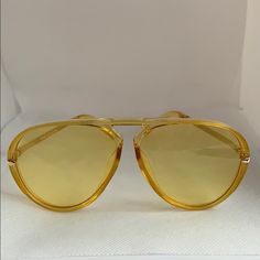 Yellow And Gold Aviator Sunglasses/Brand New Never Worn Casual Gold Sunglasses With Glass Lenses, Yellow Sunglasses With Uv Protection For Spring, Casual Gold Glass Sunglasses, Casual Yellow Sunglasses For Spring, Trendy Yellow Sunglasses With Uv Protection, Casual Yellow Sunglasses For Summer, Casual Yellow Sunglasses With Uv Protection, Chic Yellow Sunglasses With Uva Protection, Yellow Casual Sunglasses For Spring