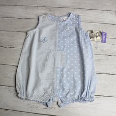 Carter's Vintage Bubble Romper Infant Baby Girl Size 9-12 Months This Sleeveless One-Piece Summer Bubble Romper Is Beyond Adorable. It Is A Pale Periwinkle Blue And White. One Side Is Made Of Blue And White Striped Seersucker Fabric And The Other Side Is Smooth Cotton With Polka Dots. It Has A Dainty Gathered Pocket On The Front With Dimensional Butterflies. The Neckline, Sleeves And Hems Have Ric Rac Trim. It Has A Back Button Fastener And Snaps In The Diaper Area. It Vintage In Age And Is Bran Blue Fitted Bubble Romper For Spring, Fitted Blue Bubble Romper For Spring, Spring Fitted Blue Bubble Romper, Fitted Blue Bubble Romper For Playwear, Casual Blue Bubble Romper For Spring, Blue Sleeveless Casual Bubble Romper, Blue Bubble Romper For Summer Playtime, Summer Blue Bubble Romper For Playtime, Light Blue Cotton Bubble Romper For Summer