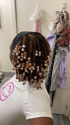 #starterlocs #2strandtwist #twostrandtwist #twostrandtwistlocs #locstyles #locs #locstylesforwomen #blackhairstyles #locjourney #blackwomenwithlocs #blackwomenshairstylesnatural #lochairstyles Short 2 Strand Twist Starter Locs, Very Short Locs With Beads, Natural Locs With Beads, Two Strand Loc Bob, Locs With Wooden Beads, Affordable Lace Front Wigs, Hair Twists Black, Weave Hairstyles Braided