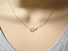 "This dainty and delicate Elephant necklace is perfect for your everyday, birthday, best friends and someone special! * I ship in 1- 3 days in a gift box from California * Chain: Gold, Silver rhodium or Rose gold over brass * Elephant Pendant: Brushed Gold, Silver rhodium or Rose gold over brass, 15mm {Custom - Extra long Chain} If you would like a longer chain (20\" to 34\"), please add this in your cart after select any necklace length. https://www.etsy.com/listing/614040250/extra-long-chaingo Delicate Tiny Charm Necklaces For Wedding, Tiny Simple Charm Necklace As Gift, Simple Tiny Charm Necklace For Gift, Simple Tiny Charm Necklaces For Gifts, Simple Tiny Charm Necklaces As Gift, Dainty Handmade Necklace For Best Friend, Dainty Delicate Chain Necklace For Best Friend, Delicate Simple Necklace For Gift, Delicate Necklace With Simple Design For Gifts