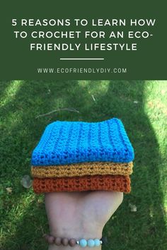 someone is holding their hand in front of the camera with text overlay that reads 5 reasons to learn how to crochet for an eco - friendly life style