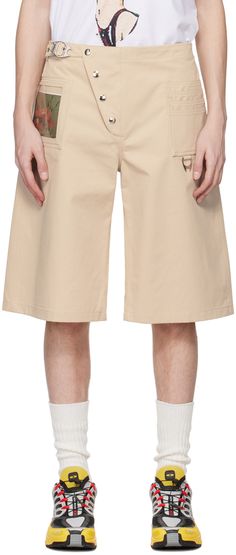 BCI-certified cotton twill shorts. Patch pockets throughout. · Pin-buckle fastening at offset button closure · Zip-fly · ID window at front · D-ring at front and back · Adjustable button-tabs at back waistband · Logo-engraved silver-tone hardware Supplier color: Beige Chopova Lowena, Knife Pleats, Clothing Pants, Twill Shorts, Silver Engraving, Check Pattern, D Ring, Cotton Poplin, Stretch Cotton