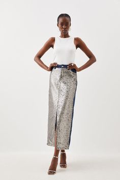 Feel Confident In Our Maxi Skirt, Made In High Quality Denim Fabric, Featuring A Statement Sequin Panel In The Front, A Straight Fit And A High Waistline For A Universally Flattering Fit. Style It With A Blouse An Heels For An Elevated Evening Look, Then A T-Shirt And Trainers For A More Casual Approach. Denim & Sequin Maxi Skirt High Quality Denim Fabric Sparkling Sequin Panel Flattering Straight Fit Thigh High Leg Split Comfortable, High Waistline Pocket Features Button Front Fastening Skirt With Boots, Sequin Maxi Skirt, Maxi Sequin Skirt, Dress Leather Boots, Winter Coat Dress, Plus Size Workwear, Skirt Collection, Skirts Denim, Christmas Day Outfit