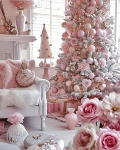 a pink christmas tree in a living room