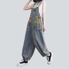 Introducing the 2023 Spring-Summer Collection's city trend baggy painted denim jumpsuit ââ‚?a everlasting classic made for the trendsetters!Why You Need This JumpsuitThis statement piece is textured to bring out the best of contemporary fashion and ageless seattle-sound flair. With its baggy and damaged denim fabric. it's a perfect blend of comfort and sophistication. Plus. the suspenders closure ensures ease and effortless style.Key Highlights: Grunge-Inspired: A classic timeless that captures Trendy Wide Leg Cotton Jumpsuits And Rompers, Trendy Wide-leg Cotton Jumpsuits And Rompers, Trendy Cotton Wide Leg Jumpsuits And Rompers, Trendy Wide-leg Cotton Jumpsuit, Spring Denim Overall Jumpsuit With Pockets, Trendy Wide Leg Cotton Overalls, Relaxed Fit Overalls For Spring, Spring Wide Leg Overalls With Pockets, Baggy Cotton Denim Jumpsuit For Fall