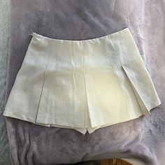 Tennis Skort Size Medium , White / Cream Color. Never Worn. New Without Tags White Skort With Short Inseam For Spring, Spring White Skort With Short Inseam, White Casual Mini Skirt With Short Inseam, Casual White Mini Skirt With Short Inseam, White Cotton Skort With Short Inseam, White Summer Skort With Short Inseam, White Skort With Short Inseam For Summer, White Mini Skirt With Short Inseam For Summer, White Cotton Tennis Skirt For Day Out