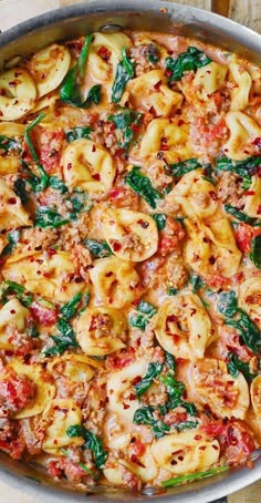 Creamy Tortellini with Sausage, Spinach, Tomatoes, and Mozzarella in a stainless steel pan Tomato Spinach Cream Sauce, Tortellini With Sausage, Tortellini With Spinach, Mozzarella Cheese Sauce, Spinach Cream Sauce, Creamy Tortellini, Tomatoes And Mozzarella, Sausage Spinach, Tomato Spinach