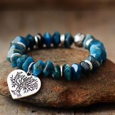 Blue Apatite Crystal, Handmade Charm Bracelets, Tree Of Life Bracelet, Tree Of Life Jewelry, Pearl Choker Necklace, Nature Inspired Jewelry, Blue Apatite, Handmade Charms, Stretchy Bracelets