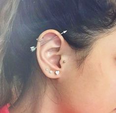 a woman with ear piercings on her ears