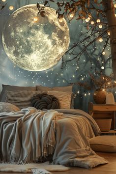 a bedroom with a full moon in the sky and string lights hanging from the ceiling