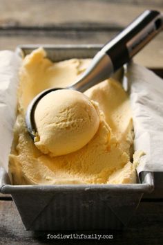 a scoop of ice cream in a metal container