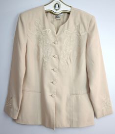 Women's beige embroidered blazer jacket Justin Taylor 100% polyester Size 10 Measurements when laid flat: armpit to armpit - 20in, length from the top of shoulder to hem - 27.25in There is a faint spot on the front/shoulder as shown in the photos Please feel free to contact me with any questions! Please read each listing carefully. We will make every attempt possible to resolve the issue if we made a mistake. Payment: Payment is due within 5 days of purchase. Thanks! Formal Tailored Blazer With Floral Embroidery, Tailored Floral Embroidered Blazer For Formal Occasions, Spring Embroidered Notch Lapel Blazer, Elegant Floral Embroidered Outerwear For Work, Tailored Embroidered Blazer With Notch Lapel, Formal Fitted Outerwear With Floral Embroidery, Winter Formal Blazer With Floral Embroidery, Floral Embroidery Fitted Formal Outerwear, Elegant Embroidered Spring Outerwear