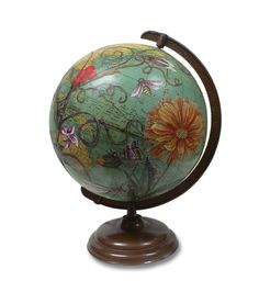 an old fashioned globe with flowers on it