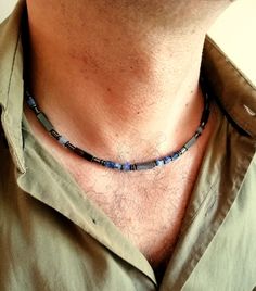 Mens beaded necklace made of natural sodalite and black hematite stone beads with lobster clasp closure.  Natural stones beaded necklace, a nice gift for him. All metal components are stainless steel. Necklace length: 18 inches (45 cm) Sodalite beads: 4 mm Hematite beads: 13x4 mm, 6x4 mm For all products are used only genuine high-quality Italian leather, natural stones and wood. All metal materials are lead and nickel free.  /Gift wrapping and packaging/ :   All items ordered will be placed in a gift bag and shipped in a bubble mailer. /Jewelry care instructions/: Not recommended bathing, physical activity, swimming, sleeping while wearing jewelry. It may damage all the components of the product. Masculine Beaded Necklace, Blue Labradorite Gemstone Bead Necklaces, Mens Lapis Lazuli Necklace, Artisan Hand-strung Blue Beaded Necklace, Handmade Blue Sodalite Necklaces, Beaded Necklace For Men, Beaded Necklace Black, Sodalite Jewelry, Black Beaded Necklace