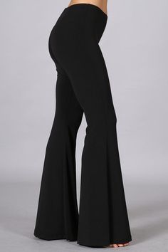 Chatoyant Basic Bell Bottoms Black Solid basic bell bottom flare pants with elastic waist in a comfortable and stretchy fit. Smooth, cool, wrinkle-free, non-pilling, and machine-washable fabric. Perfect for casual wear and everyday wear, a must have staple for your wardrobe! Stay Sexy! Fabric: Polyester/Spandex 95/5 Proudly made in the USA Black Bell Bottoms Leggings, Black Leggings Bell Bottoms, Black Pants Bell Bottoms, Legging Bell Bottoms, Black Bell Bottom Leggings, Bell Bottom Leggings Outfits, Bellbottom Pants Outfits, Black Bell Bottoms Outfit, Bellbottom Leggings