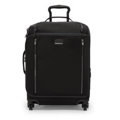 This carry-on is lightweight, organized, and inherently spacious. The modern silhouette pairs with contemporary style and ultra-functionality for a premium traveling experience. Modern Black Luggage With Luggage Sleeve, Modern Black Luggage With Sleeve, Black Luxury Travel Accessories For On-the-go, Modern Black Travel Accessories For Commuting, Modern Black Leather Luggage, Functional Black Luggage With Leather Trim, Modern Nylon Luggage For Trips, Functional Black Luggage For Business, Modern Black Luggage For Business Trips