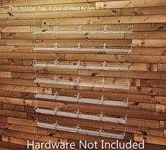 a wooden wall with several shelves attached to it and the words hardware not included below