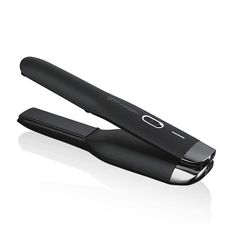 Ghd cordless hair straightener in sleek black design, perfect for on-the-go styling and touch-ups anytime, anywhere. Ghd Unplugged, Cordless Hair Straightener, Burnt Hair, Best Hair Straightener, Hair Straighteners Flat Irons, Hair Straightening Iron, Ceramic Heater, Thick Curly Hair, Hair Straighteners