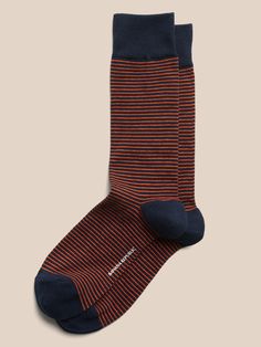 A soft sock in a breathable stretch-cotton blend with rib-knit openings and angled toe seams for a better, more comfortable fit.  Fits men's shoe sizes 8-12. Dress Socks For Men, Casual No-show Fitted Socks, Casual Fitted No-show Socks, Comfortable Striped Cotton Socks, Comfortable Cotton No-show Socks, Comfortable No-show Cotton Socks, Casual Striped Stretch Socks, Casual Stretch Striped Socks, Fitted Red Cotton Socks