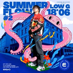 a man standing in front of an octopus on top of a blue building with the words summer flow above it