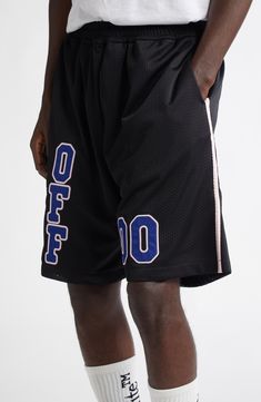 Color-pop logo appliqués bring high-scoring detail to basketball shorts made of breathable mesh and sized to hit at the knees for authenticity on and off the courts. 6" inseam; 27" leg opening; 14" front rise; 16" back rise (size Medium) Elastic waist Lined 100% polyester Machine wash, dry flat Made in Portugal Casual Basketball Shorts, Casual Basketball Athletic Shorts, Casual Blue Basketball Shorts, Sporty Black Bottoms For Basketball, Black Sporty Basketball Bottoms, Casual Blue Basketball Athletic Shorts, Black Sportswear Bottoms For Basketball, Casual Blue Athletic Shorts For Basketball, Black Athleisure Bottoms For Basketball