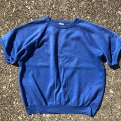 1980s vintage royal blue short sleeve sweatshirt  Reads XL  Cotton/polyester  50/50  Measurements taken laying flat  Pit to pit 23.5  Length 25.5  #shortsleeve #raglan #sweat #vintage #blank Blue Short Sleeve Sweatshirt For Streetwear, Blue Short Sleeve Sporty Sweatshirt, Sporty Blue Short Sleeve Sweatshirt, Royal Blue Shirt, Sweat Vintage, Royal Blue Shirts, Royal Blue Shorts, Short Sleeve Sweatshirt, 80s Shirts