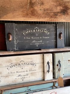 several wooden boxes are stacked on top of each other