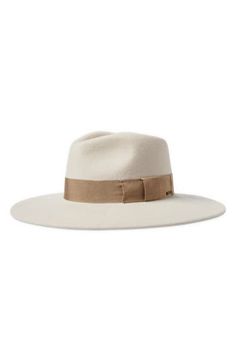 Any outfit instantly looks cooler when you top it off with this wide-brim hat crafted from felted wool and trimmed with a tonal grosgrain ribbon. Adjustable interior hook-and-loop strap for a custom fit 100% wool Spot clean Imported Wool Brimmed Hat For Rodeo, Elegant White Brimmed Felt Hat, White Wide Brim Felt Hat For Ranch, White Flat Brim Wool Hat, Brixton Hat, Rancher Hat, Brim Hat, Wide Brimmed Hats, Wide Brimmed