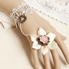 Include:?Bracelet Product Code:?LIN01296 Color:?White Gender:?Female Materials:?Lace,Bronze Accessories,Ribbon Notice:?Other Accessories Are Not Inclued Length:?13cm Width:?3.8cm Trend:?Fashion Vintage White Bracelet Wristband Ring One Chain Female Bride Bridesmaid Bracelet The width of the lace is about 3.8CM, and the length of the front lace part of the normal size is about 13CM. Behind is the button and adjustment chain, which can be adjusted to 15cm for tightness and 22cm for looseness. Hand Kawaii Images, Bronze Accessories, Hand Chain Bracelet, White Bracelet, Pink Accessories, White Bracelets, Bridesmaid Bracelet, Hand Chain, Trend Fashion