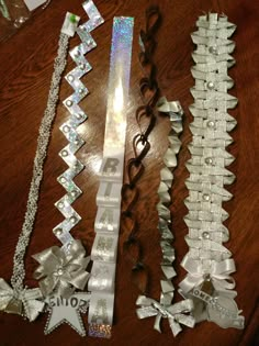 several ribbons and bows are laid out on a table