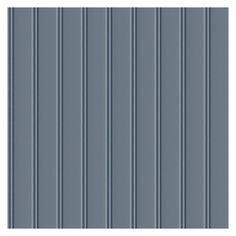 a gray wall with vertical stripes on it