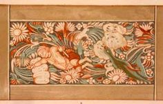 an ornately decorated wall panel with birds and flowers