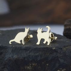 Description Dainty Cat Gold Studs - 14K Gold Animal Earrings - Whimsical Pet Lover Jewelry - Small Gold Stud Earrings for Women. ≫ Features * Items Code: SGT00119 * Metal: 14K Solid Gold  * (18K also available - Additional fees may apply) * Solid 14K Yellow Gold with stamped * More options in gold color: Rose, yellow, White gold * Size :- 10 mm  ≫ FAQ below for more detail. ✦ Measurement / Sizing  We can adjust most items to fit your sizing preferences. Most items can be made to any size and len Lover Jewelry, Special Christmas Gift, Gold Animals, Diamond Cluster Earrings, Animal Earrings, Gold Stud Earrings, Stud Earrings For Women, Cat Earrings, Gold Stud