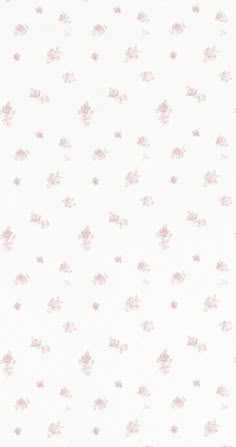 a white and pink wallpaper with small flowers on the bottom half of it's surface