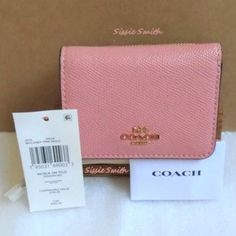 Nwt Coach Candy Pink Small Trifold Wallet In Colorblock Product Details: Color: Candy Pink/Multi Gold Tone Hardware Crossgrain Leather 2 Credit Card Slots Id Window Full-Length Bill Compartment Snap Closure Outside Zip Coin Pocket 4" (L) X 3 1/4" (H) X 1 1/2" (W) Style No: 2923 Mfsrp: $150.00 Compact Coach Wallet, Compact Coach Trifold Wallet With Card Slots, Compact Coach Wallet As Gift, Coach Bifold Coin Purse With Card Slots, Coach Trifold Wallet With Rfid Blocking, Coach Rfid Blocking Trifold Wallet, Compact Coach Wallet With Interior Card Slots, Elegant Pink Bifold Coin Purse, Formal Coach Card Holder